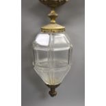 A gilt brass and panel cut glass hall lantern, 50cms