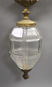 A gilt brass and panel cut glass hall lantern, 50cms