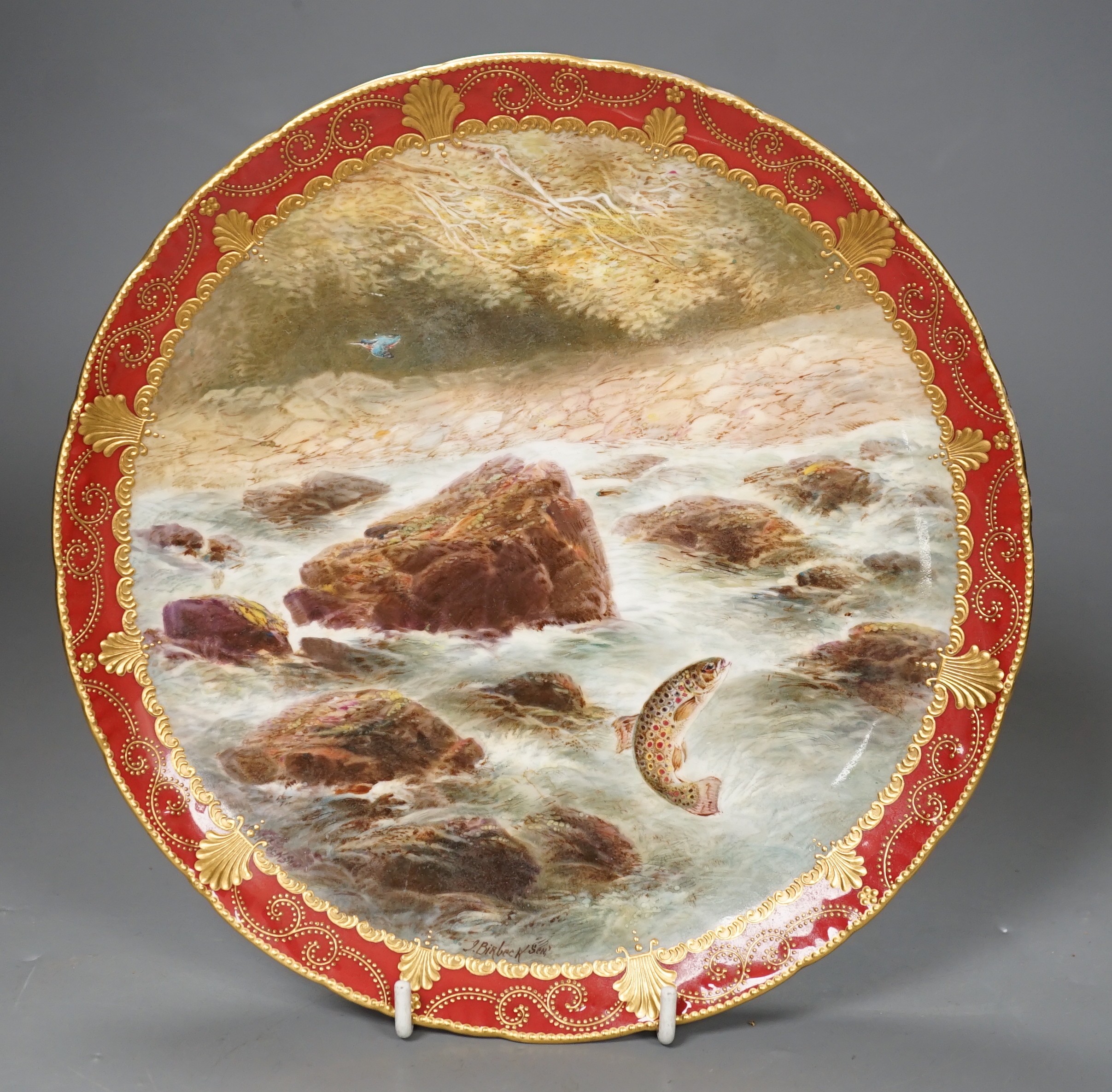 Joseph Birbeck Senior for Cauldon, a cabinet plate painted with a leaping salmon, signed, 22cm