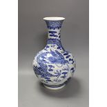 A large Chinese blue and white vase, damaged, 38cm