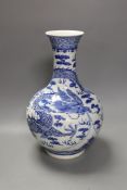 A large Chinese blue and white vase, damaged, 38cm