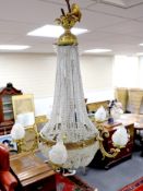 A cut and beaded glass and ormolu bag chandelier, approx 96cms high