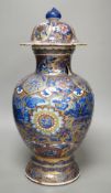 A large Chinese Kangxi vase and cover, clobbered decoration, 44cm tall, damaged