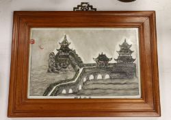 A framed Chinese enamelled porcelain plaque