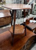 A Liberty & Co. hexagonal oak two tier occasional table, width 38cm, height 66cm