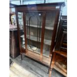 An Edwardian inlaid mahogany display cabinet, width 107cm, depth 34cm, height 168cm