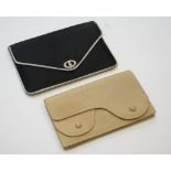 Two Christian Dior clutch bags