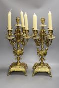 A pair of ormolu five light candelabra,49cms high