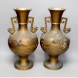A pair of Japanese two handled bronze vases, 39.5cms high