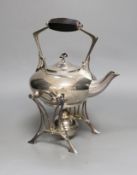 A WMF Art Nouveau silver plated kettle on stand, 29cm tall