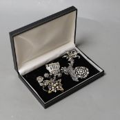Seven assorted marcasite or paste brooches.