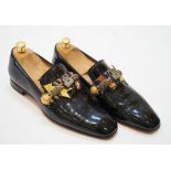 A pair of gentleman's Christian Louboutin patent leather dress shoes with applied and embroidered