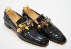 A pair of gentleman's Christian Louboutin patent leather dress shoes with applied and embroidered