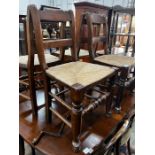 A set of four 19th century provincial elm and fruitwood rush seat dining chairs, height 87cm