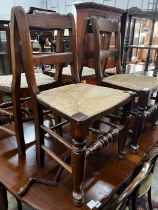 A set of four 19th century provincial elm and fruitwood rush seat dining chairs, height 87cm