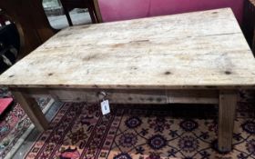 A rectangular provincial pine and oak coffee table, width 120cm, depth 74cm, height 39cm