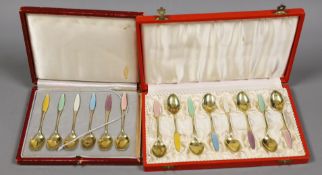 A cased set of eight Danish gilt sterling and polychrome enamelled coffee spoons and a similar cased