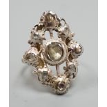 A pierced yellow and white metal, rose cut diamond cluster set ring (adapted?), size K, gross weight