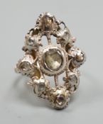A pierced yellow and white metal, rose cut diamond cluster set ring (adapted?), size K, gross weight