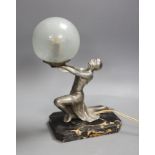 An Art Deco silvered metal figural lady lamp. 26cm high