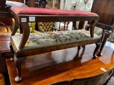 A George I style mahogany fender stool with a floral tapestry top length 101cm, height 33cm together