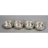 A matched set of four silver Tessier porringers, with pierced handles, London, 1946(1) and 1990(