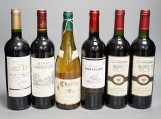 Five bottles of Bordeaux and one Chablis