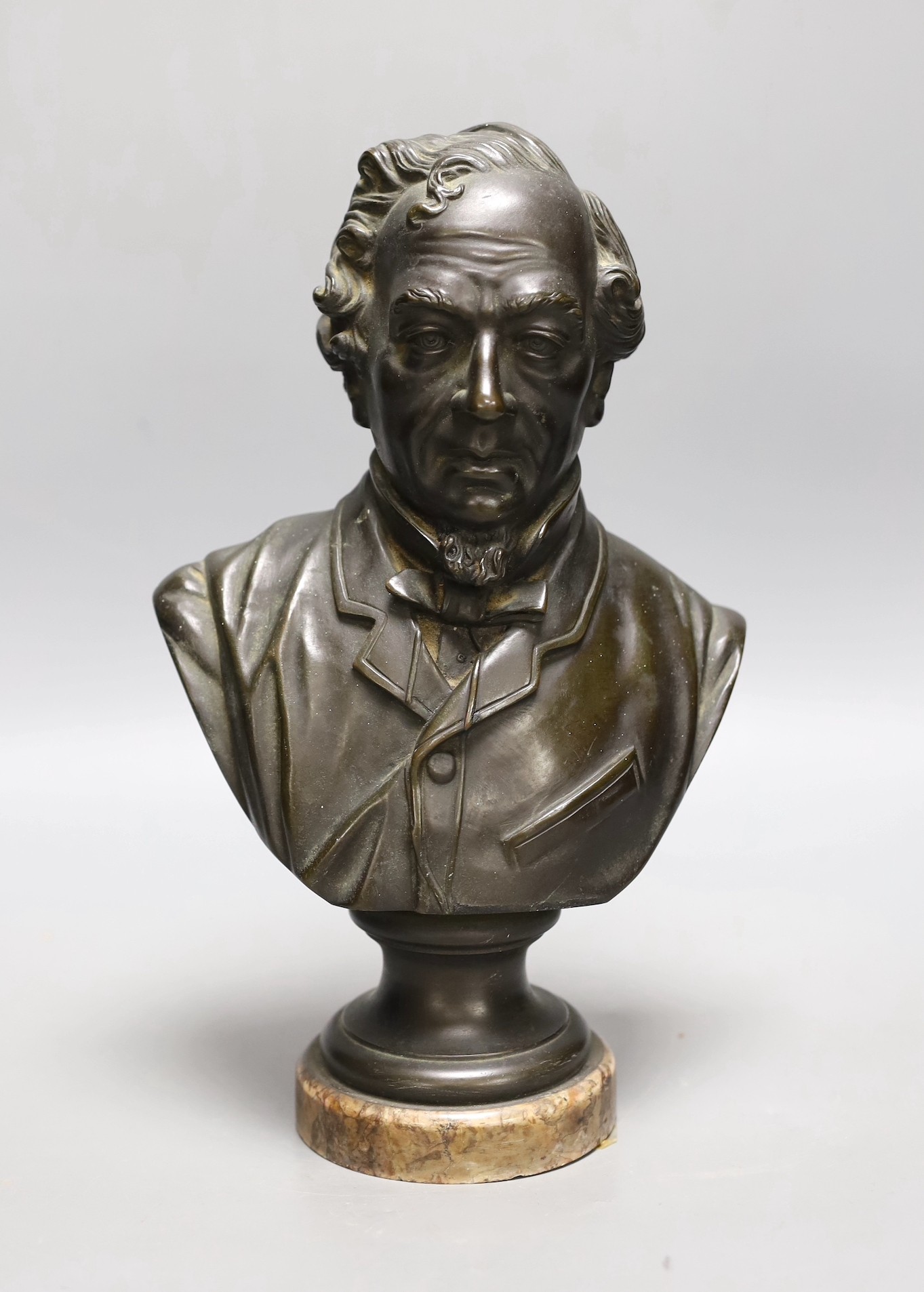 A 19th century cast bronze bust of Disraeli, 30cms high