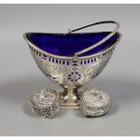 A late Victorian pierced silver sugar basket, by Nathan & Hayes, Chester, 1896, with blue glass