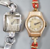 A lady's 9ct gold Rotary manual wind wrist watch, on a fabric strap, together with a lady's