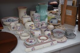A large collection of mixed Poole pottery, mostly from 1920's, including a pale turquoise glazed 503