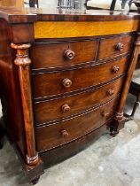 A large mid Victorian mahogany bow front chest of two short and three long drawers, bird's eye maple