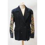 A gentleman's John Richmond double breasted wool jacket with stencilled leather arms, size M