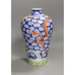 A Chinese famille verte dragon and cloud-fret vase. 20cm high