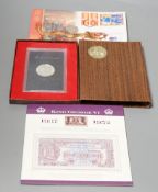 A group of QEII Royal Mint coin years sets, commemorative crowns, £5, £2 and George VI stamp,