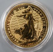 A QEII 2021 1oz gold Britannia £100 coin.
