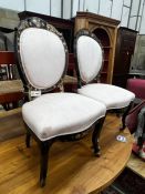 A pair of Victorian mother of pearl inlaid ebonised parcelgilt side chairs, width 52cm, depth