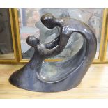 A silver lustred terracotta sculpture in the style of B. Hepworth,59cms high