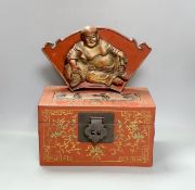 A Chinese lacquered wood Budai carving, 34 cm wide, and a Chinese lacquered wood box (2)