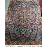 A North West Persian peach ground rug, 140 x 100cm