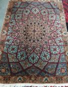 A North West Persian peach ground rug, 140 x 100cm