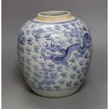 An 18th century Chinese provincial blue and white ‘dragon and phoenix’ jar, 19cm