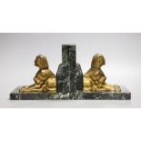 A pair of bronze and marble 'sphynx' bookends, 17cms wide x 15cms high
