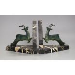 A pair of Art Deco bronze 'antelope' bookends. 12.5cm high