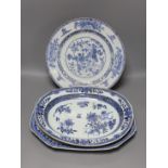 Three Chinese export blue and white dishes, 18th/19th century, largest 42cms wide