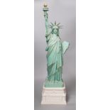 A Colbar Art Inc. bronzed resin model of the Statue of Liberty. 60cm high