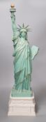 A Colbar Art Inc. bronzed resin model of the Statue of Liberty. 60cm high