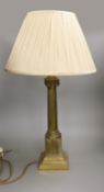 A brass Corinthian column table lamp