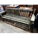 A weathered teak garden bench, length 194cm, height 83cm