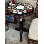 A Victorian style octagonal tripod table, width 42cm, height 76cm